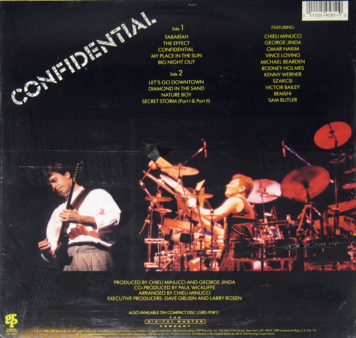 Back cover of the 1989 Special EFX album Confidential, released on GRP Records. The design features a predominantly black background with the album title Confidential in bold white stencil-style letters slanted diagonally across the top left. Track listing for Side 1 and Side 2 is displayed in bright yellow text in the upper center, including nine tracks such as Sabariah, The Effect, and Secret Storm. To the right, a list of featured musicians like Chieli Minucci, George Jinda, Omar Hakim, and Victor Bailey appears. At the bottom left, credits for producers, arrangers, and executive producers are printed. The bottom right shows legal text and a GRP logo. A striking concert photograph dominates the lower half: Chieli Minucci playing guitar on the left and George Jinda on drums surrounded by an expansive percussion setup under vivid red stage lighting.